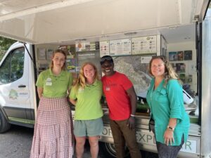 Hayley Quarrington (left - Right ) Hayden Bridgeman NFNP Ranger, Maxwell SEM CEO and Alison Barnes at the NFNP Mobile Unit.